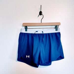 Under armour blue workout shorts loose fitting siz medium with drawstring